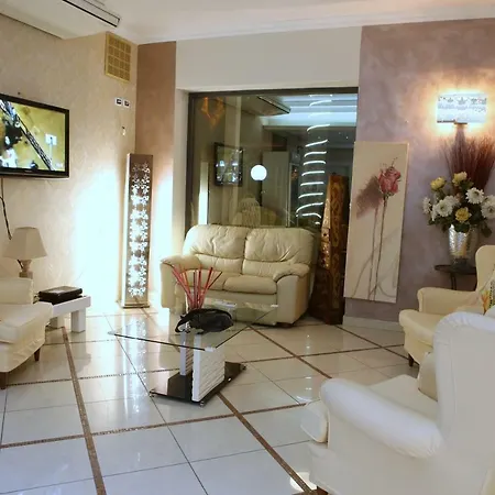 Отель Busignani